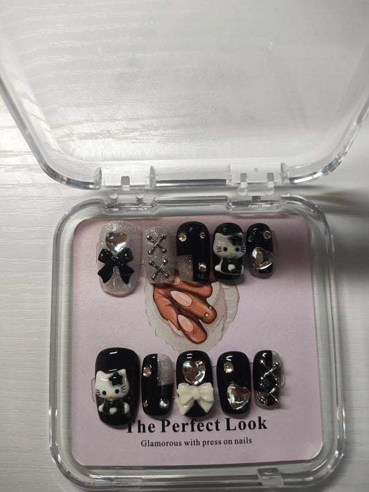 Black and silver hello kitty nails