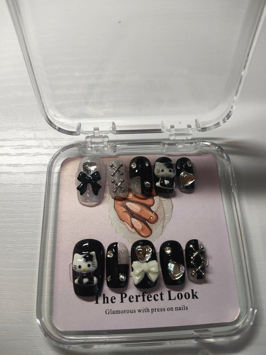 Black and silver hello kitty nails